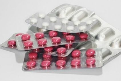tabletas de pastillas rosas y blancas